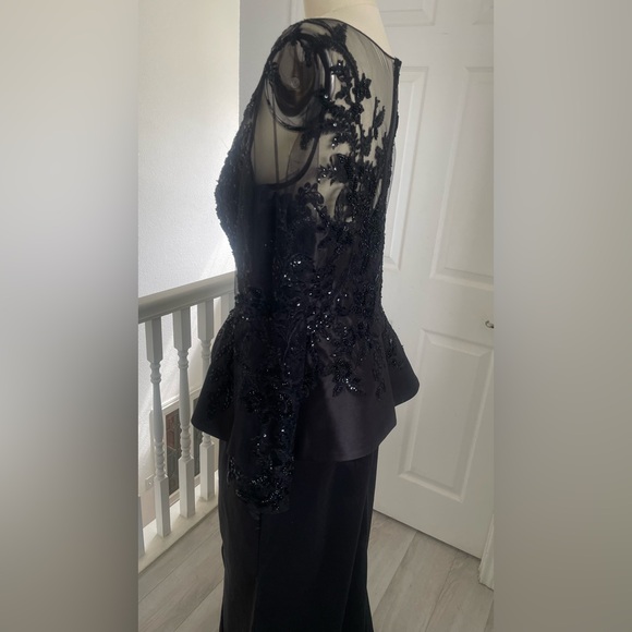 Terani Couture Embroidered Long Sleeve Front Slit Ruffled Mermaid Gown.